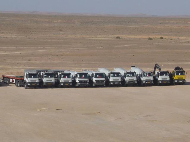 Iveco and Mercedes-Benz trucks in the desert ready for work!