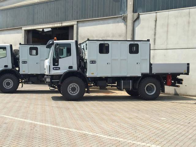 Iveco ML150E24W 4x4 with personnel carrier and flatbed.
