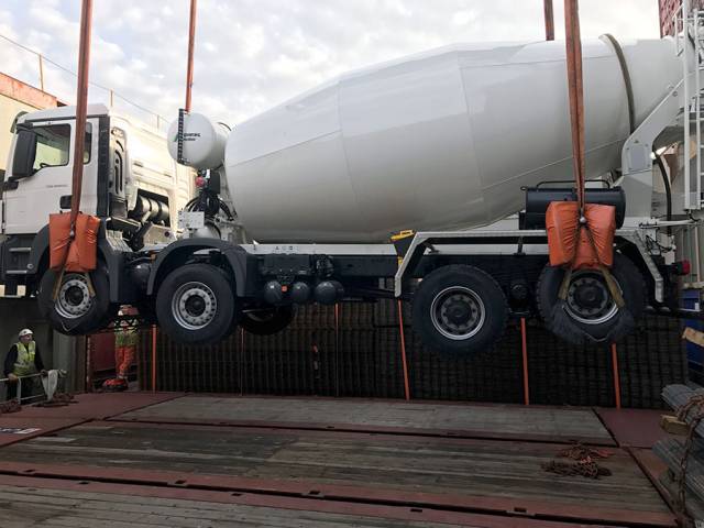 Loading of Man TGS 41.400 8x4 concrete mixer at Rotterdam port.