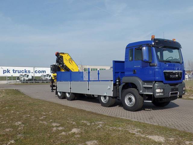 Man TGS 41.400 8x4 with Hyva crane and flatbed to Antwerp port.